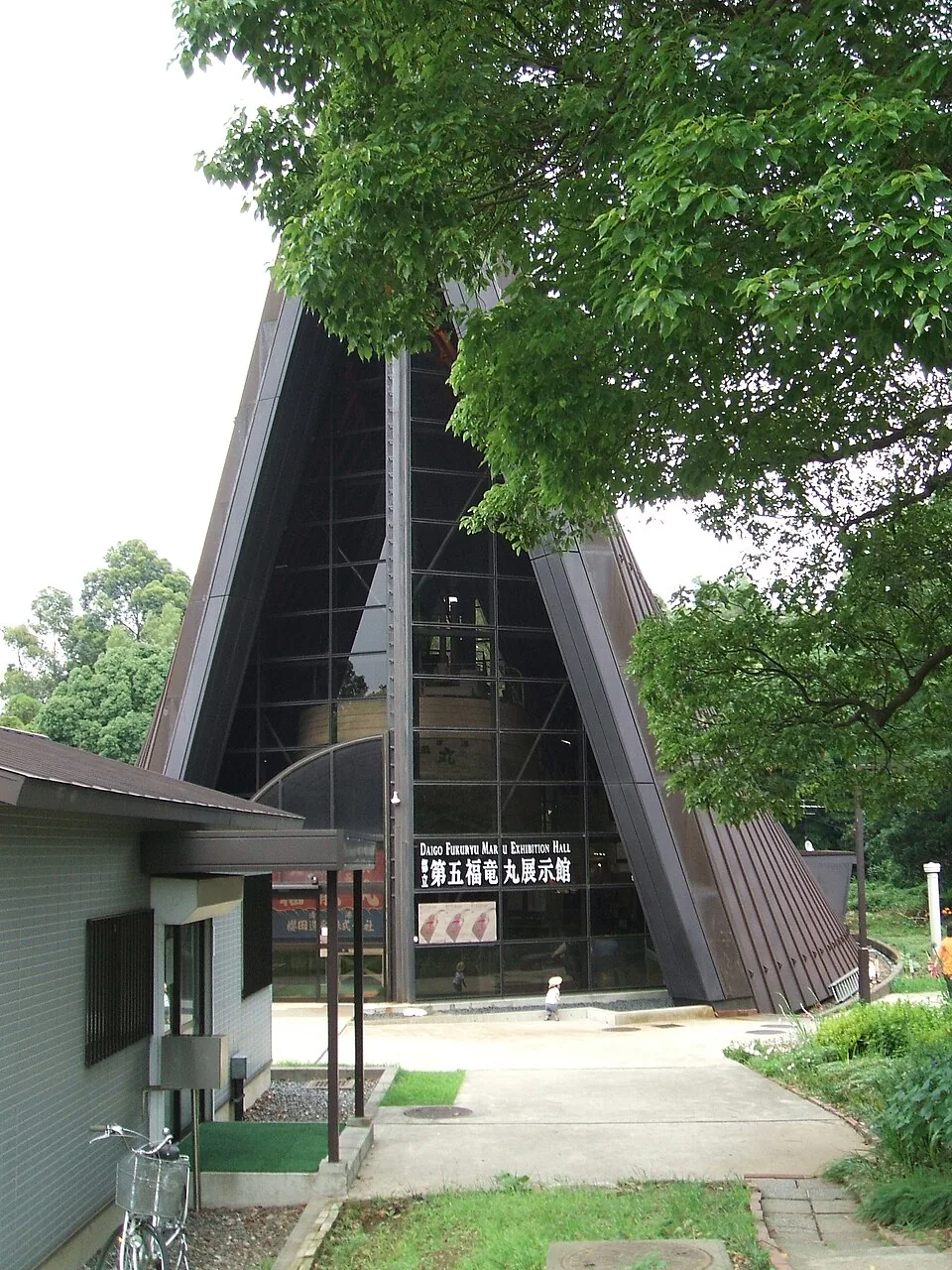 The preserved wooden fishing boat Daigo Fukuryu Maru inside its Tokyo exhibition hall