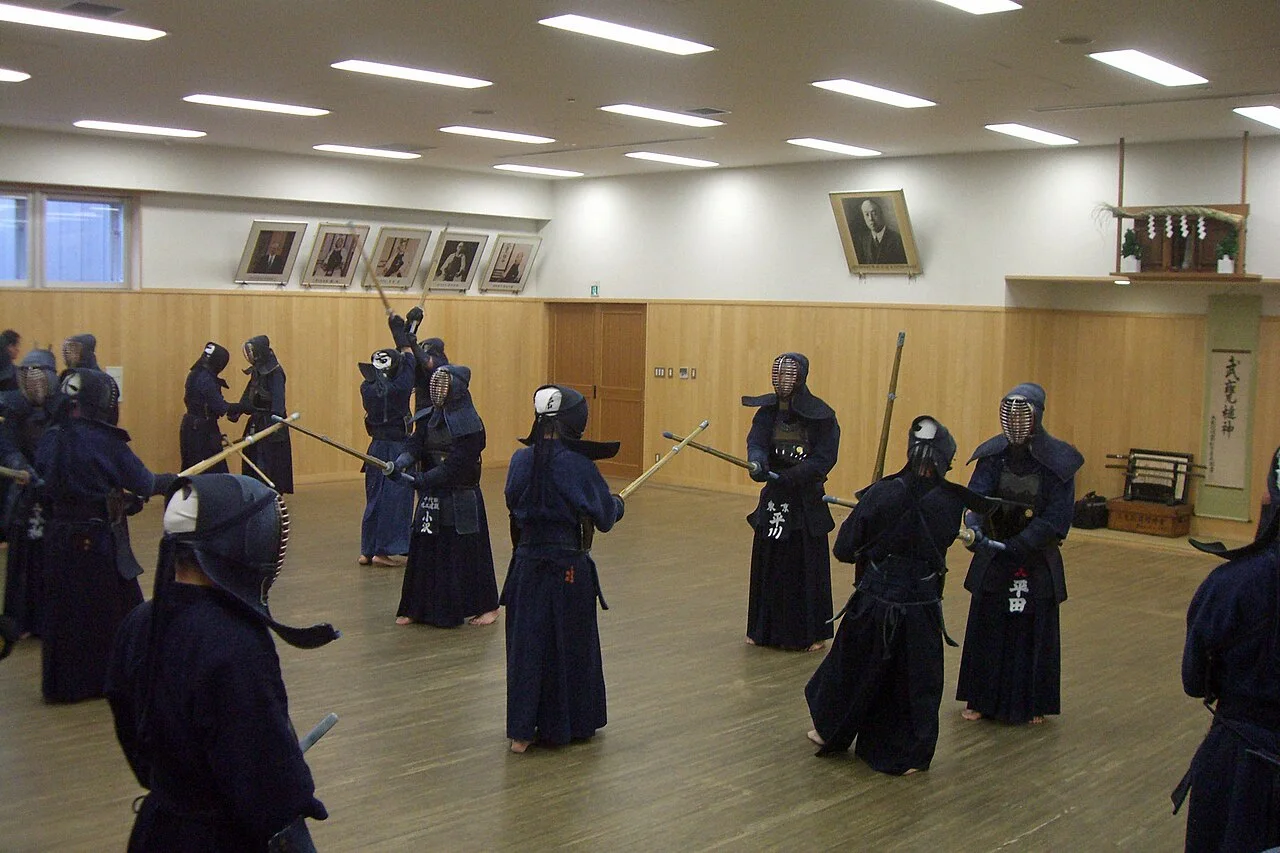 Kendo practitioners in armour training in a Tokyo dojo during winter kangeiko