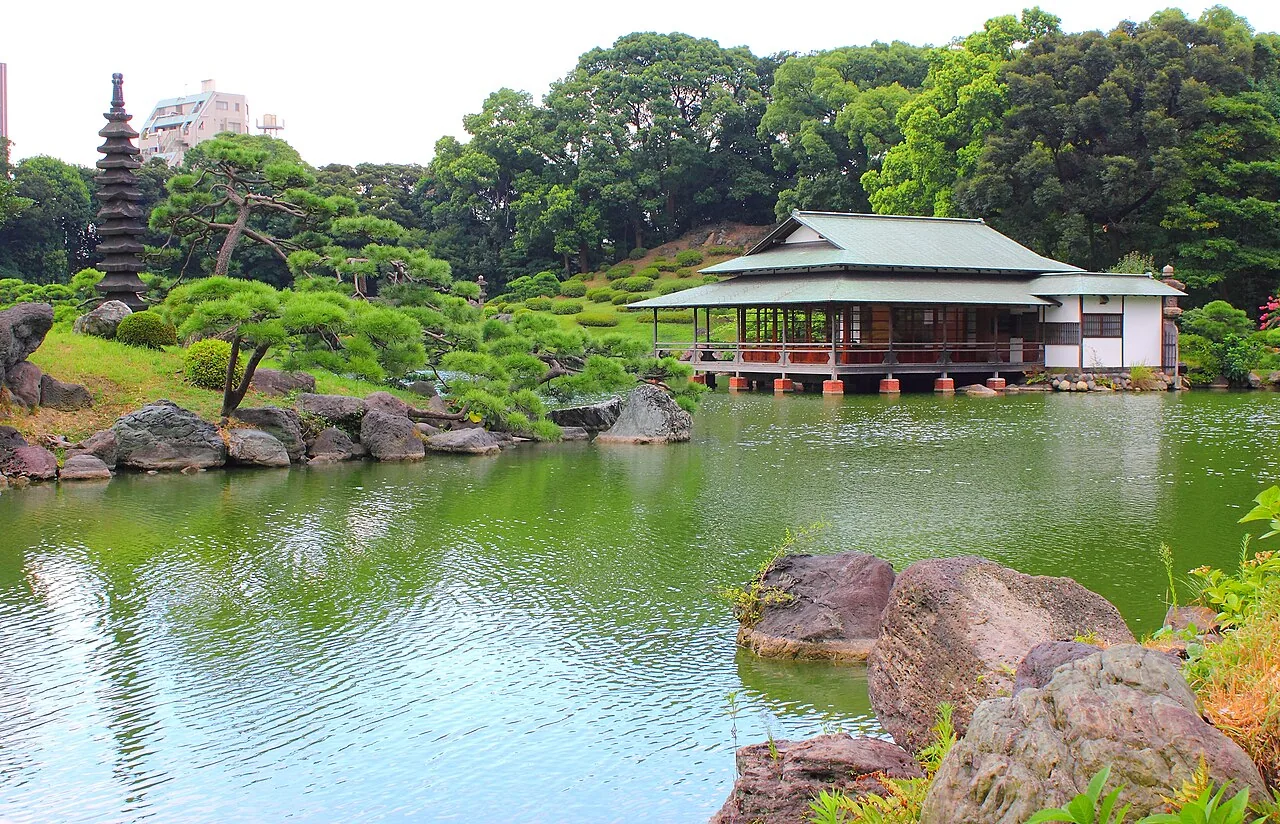 Kiyosumi Garden pond with stepping stones and pine trees, Koto City, Tokyo