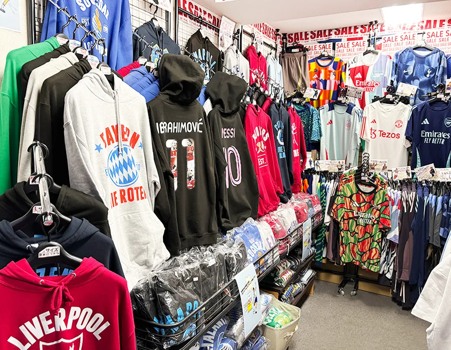 Football-inspired clothing displayed inside the fcFA RE-TAKE Store