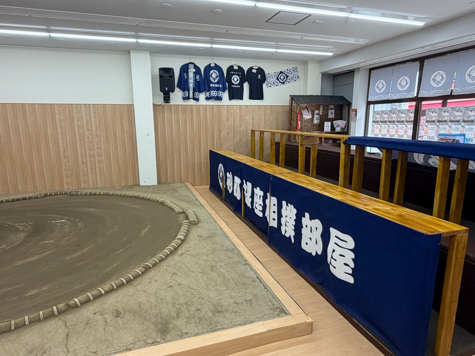 The viewing counter at the Sunamachi Ginza Sumo Stable, running along the edge of the dohyo at ring level